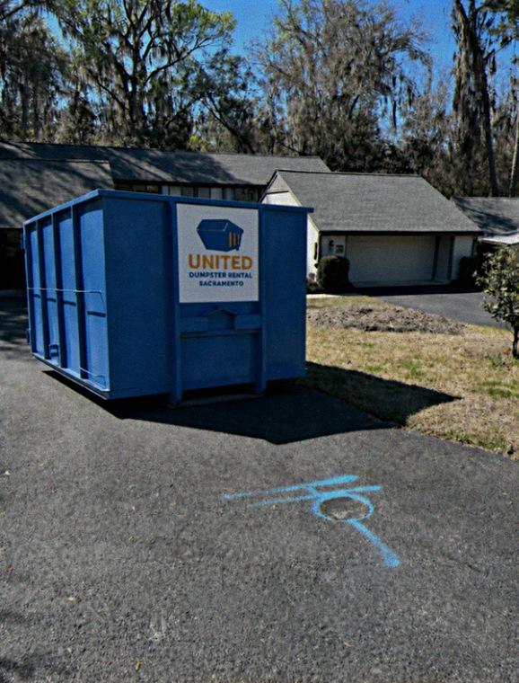 Roll-off dumpster placed for a residential cleanout
